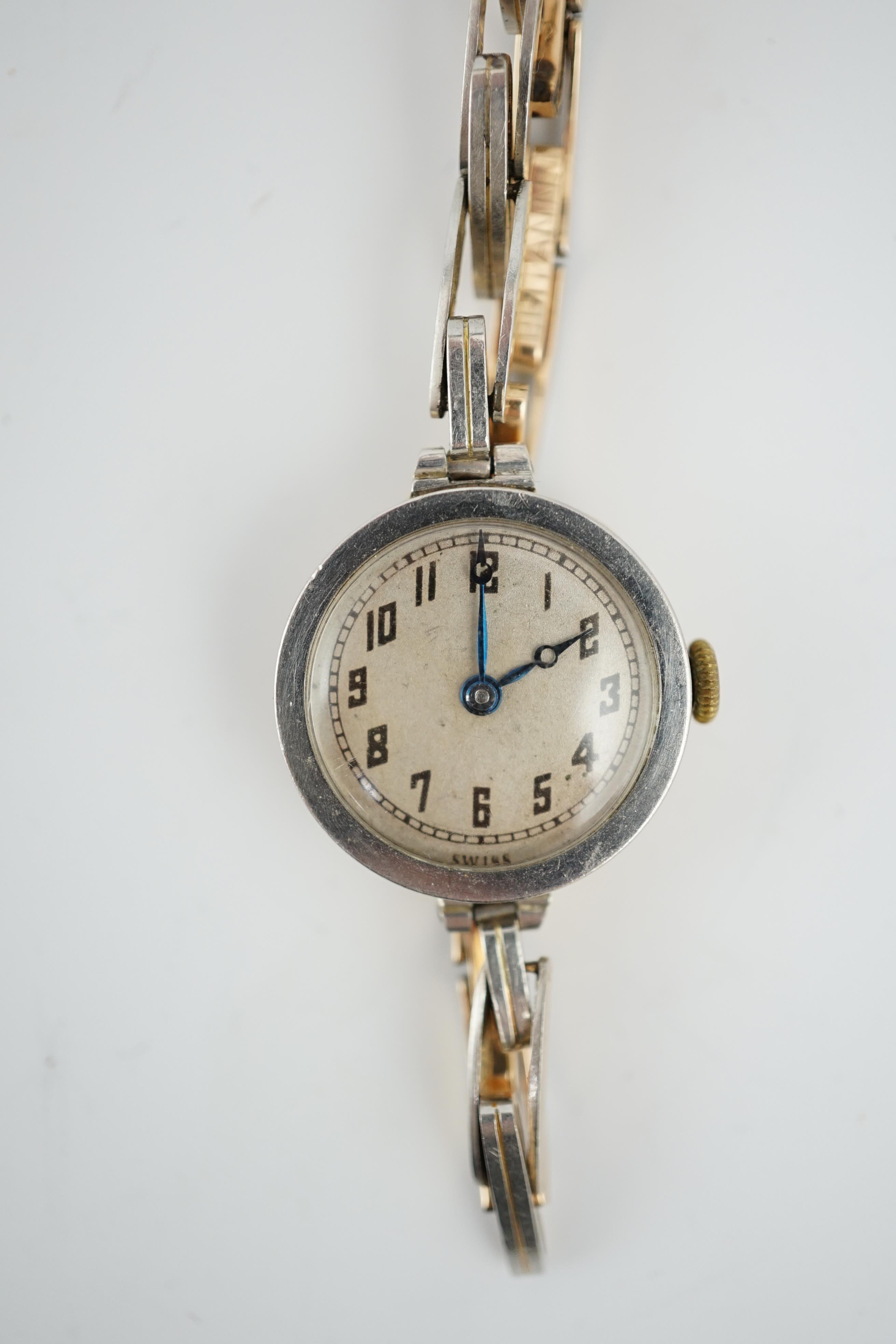 A lady's George V 18ct gold and platinum manual wind wrist watch